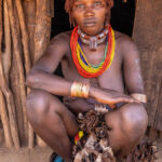 Hamar woman sitting in front of her hut. (image by Ingrid Koedood)