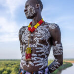 Painted traditions of a Kara man by the Omo river (image by Ingrid Koedood)