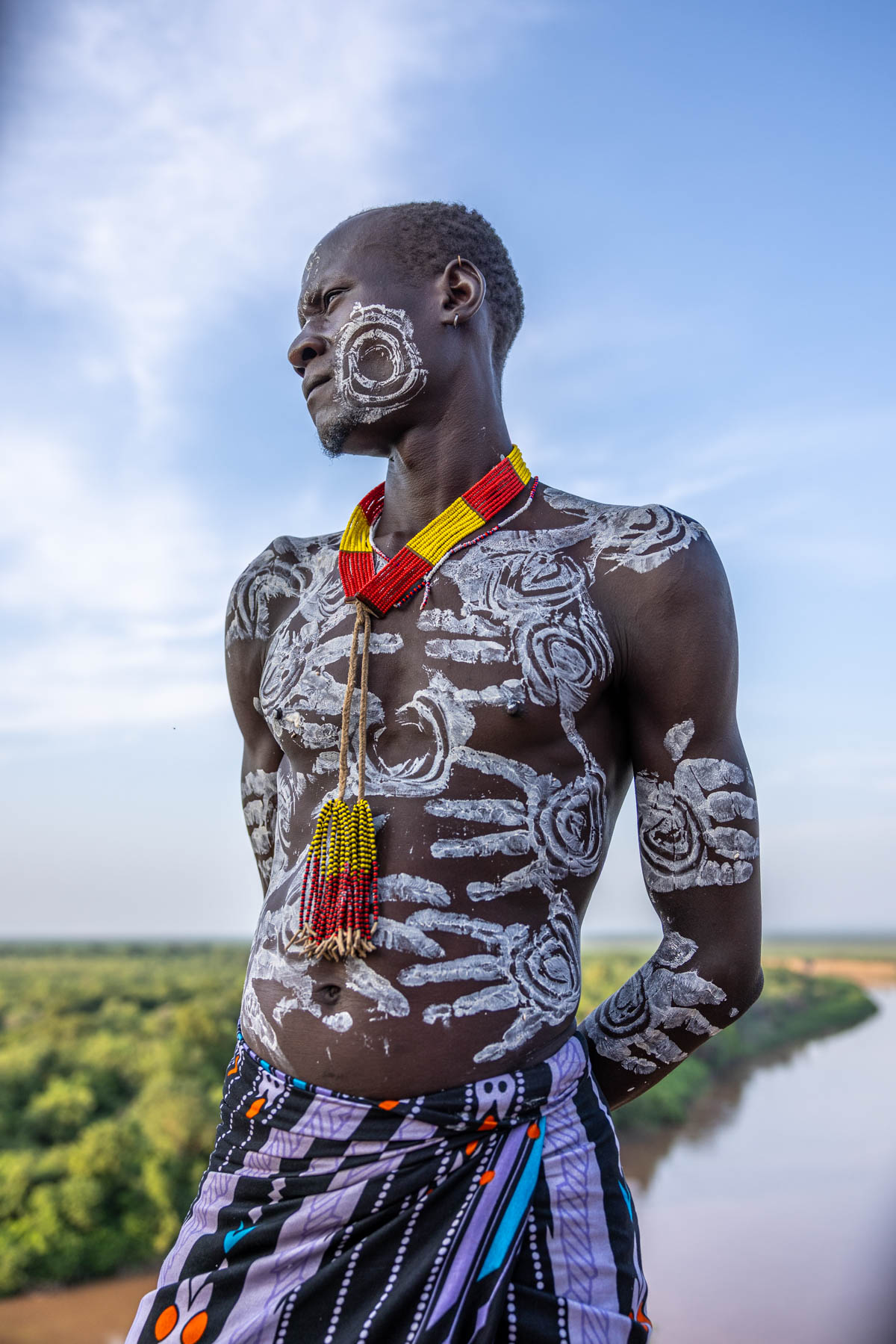 Painted traditions of a Kara man by the Omo river (image by Ingrid Koedood)