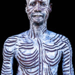 Kara man with painted face and body. (image by Ingrid Koedood)