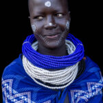 A Kara woman with a gentle, shy smile. (image by Ingrid Koedood)