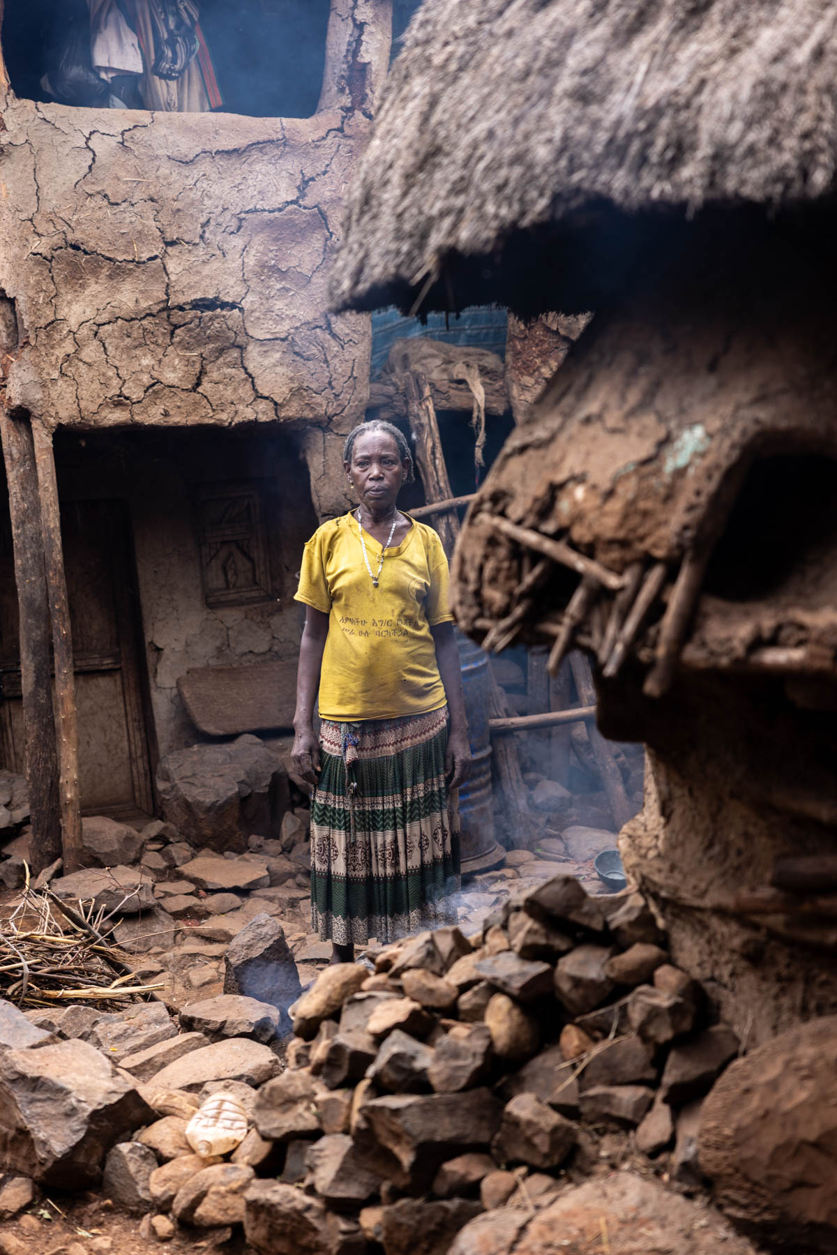 A woman in front of her house in Konso. Konso village is famous for its terraced fields and recognized as a UNESCO World Heritage Site. (image by Ingrid Koedood)
