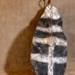 Ku'u, the traditional Mundari fighting shield, fashioned out of cow skin (image by Inger Vandyke)