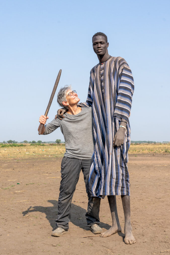 The long and the short of it - guest Amy with the tallest Dinka man of our camp who was nearly 7ft tall! (image by Inger Vandyke)
