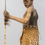Mundari man with leopard skin and spear (image by Inger Vandyke)