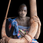 Mundari man with Tung horn (image by Inger Vandyke)