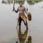 Mundari man in battle regalia (image by Inger Vandyke)