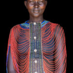 Mundari woman with beaded collar (image by Inger Vandyke)
