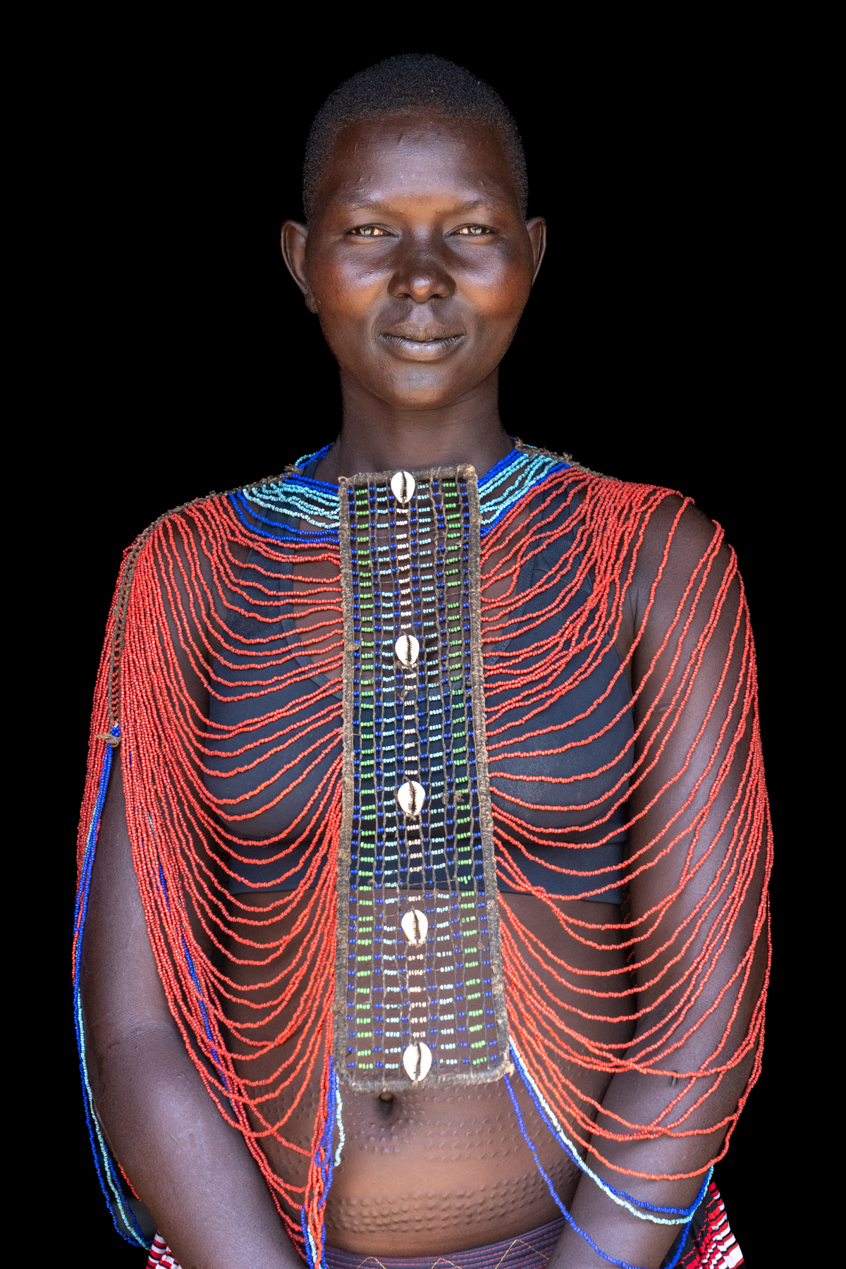 Mundari woman with beaded collar (image by Inger Vandyke)