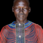 Mundari women wearing beaded collar (image by Inger Vandyke)