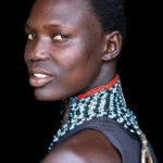 Mundari woman wearing Guet (image by Inger Vandyke)
