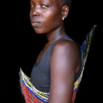 Mundari woman wearing a traditional corset (image by Inger Vandyke)