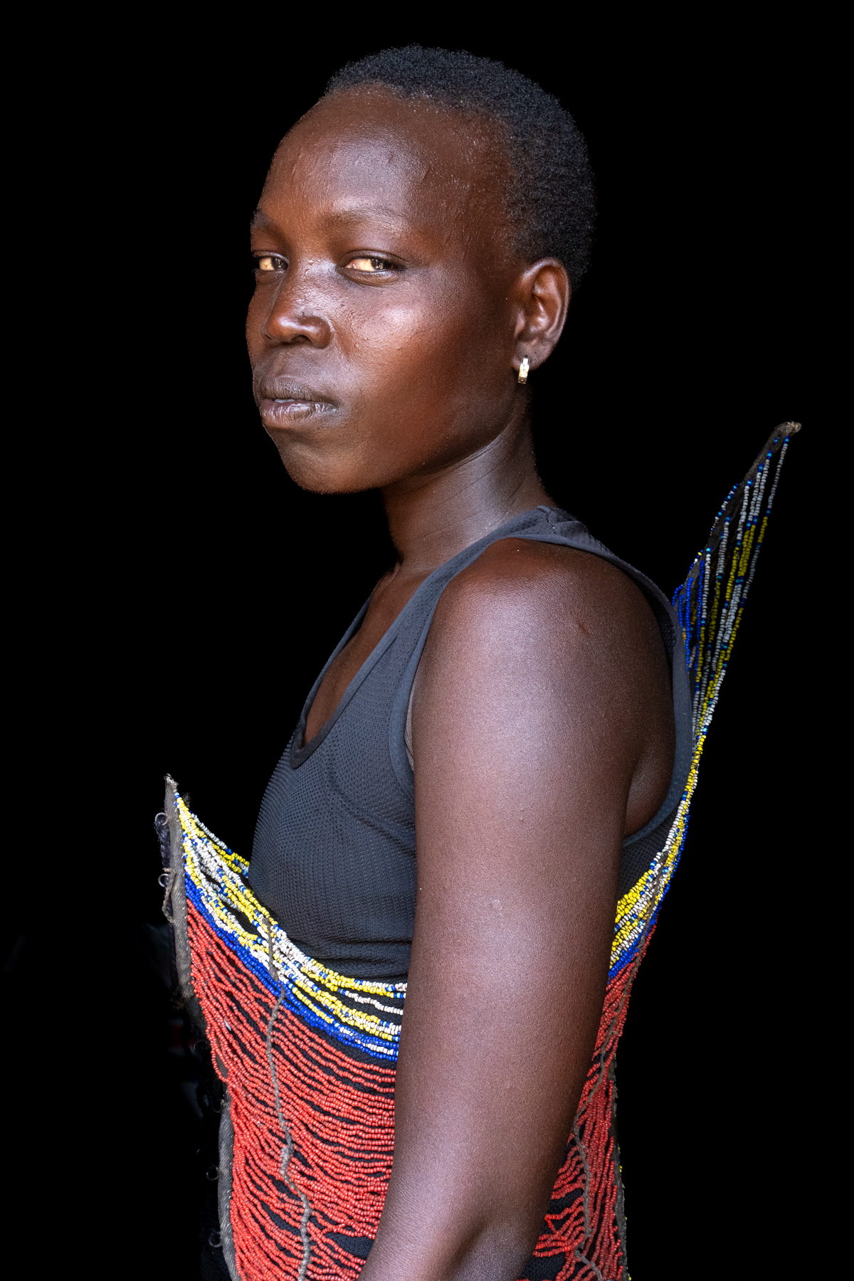 Mundari woman wearing a traditional corset (image by Inger Vandyke)