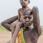 Mundari father and son (image by Inger Vandyke)