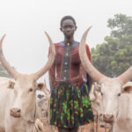 Nyanda with her cows (image by Inger Vandyke)