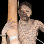 Mundari man with Tung (horn) (image by Inger Vandyke)