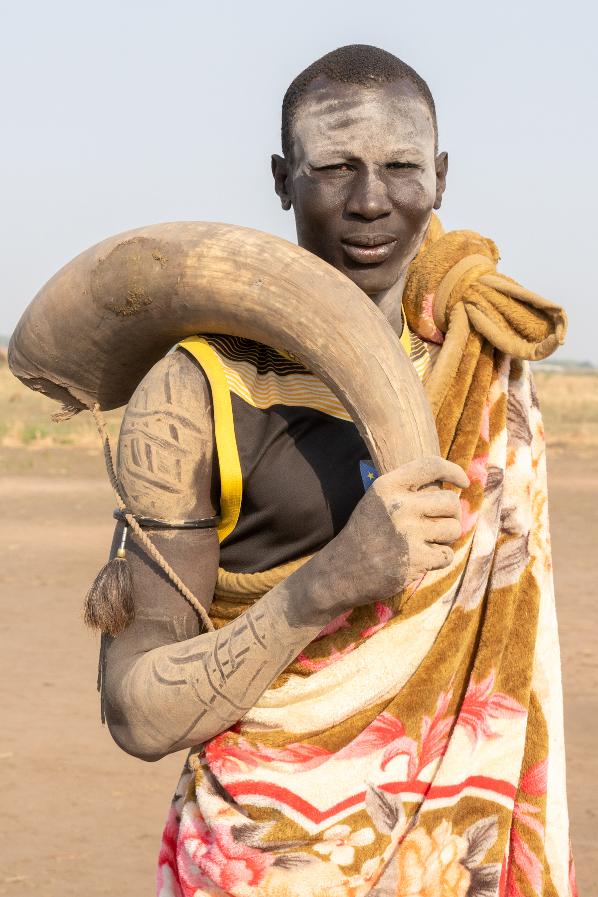 A Mundari man dressed for a ceremony (image by Inger Vandyke)