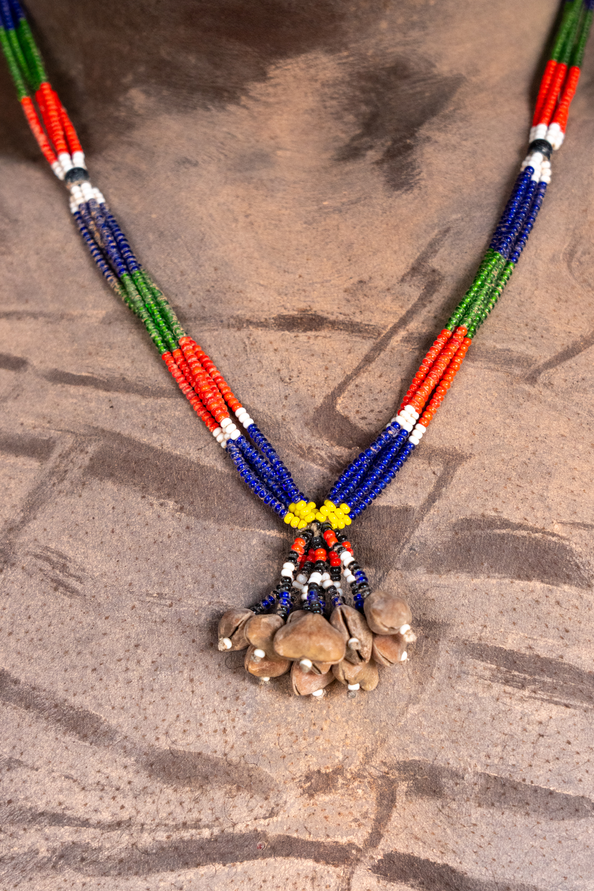 Necklace worn by Mundari men (image by Inger Vandyke)