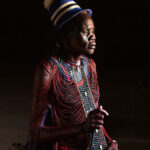 A beautiful Mundari woman in traditional wedding attire (image by Inger Vandyke)