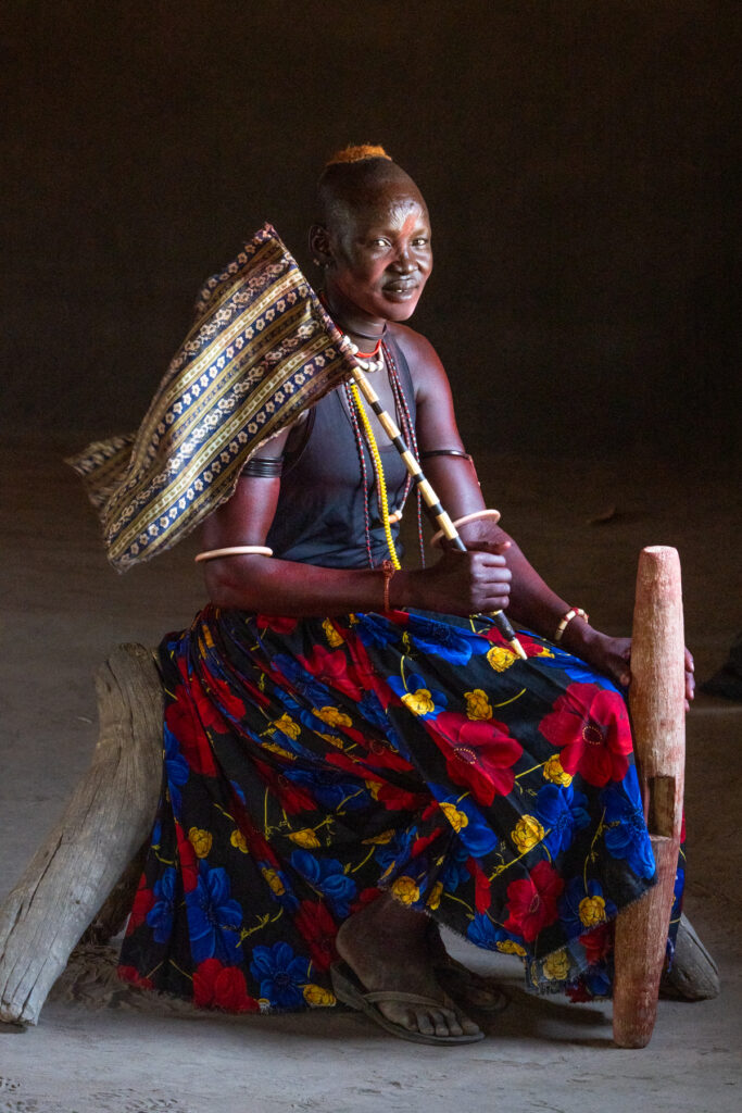 Like many Nilotic cultures, Mundari carry flags for celebrations (image by Inger Vandyke)