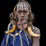 Portrait of a Mursi woman wearing a traditional lip plate. The plate is gradually stretched over time and holds deep cultural significance within the community. (image by Ingrid Koedood)