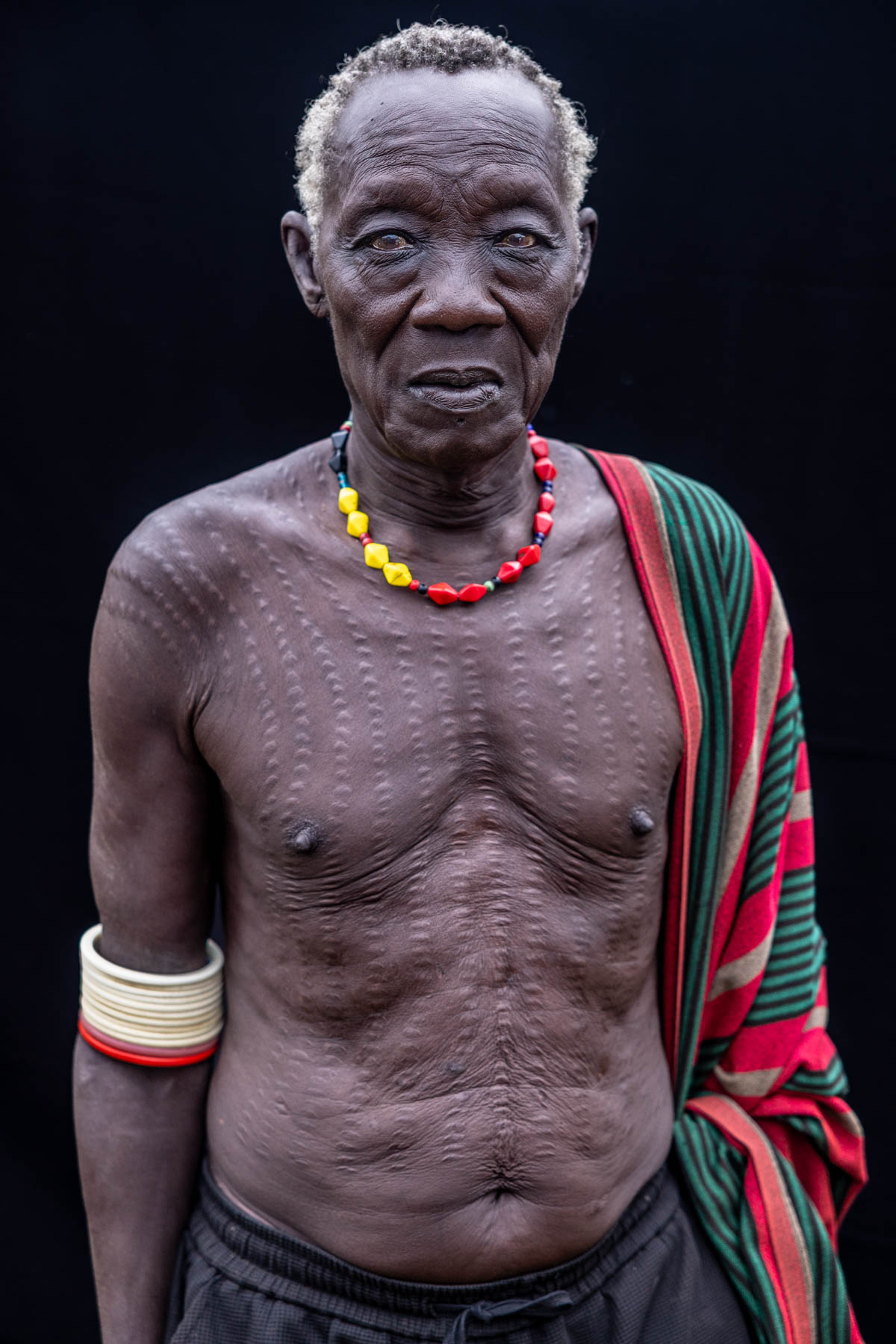 Elderly Nyangatom man with scarification on his chest. (image by Ingrid Koedood)