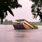 Sunken passenger ferry in the White Nile at dusk (image by Inger Vandyke)