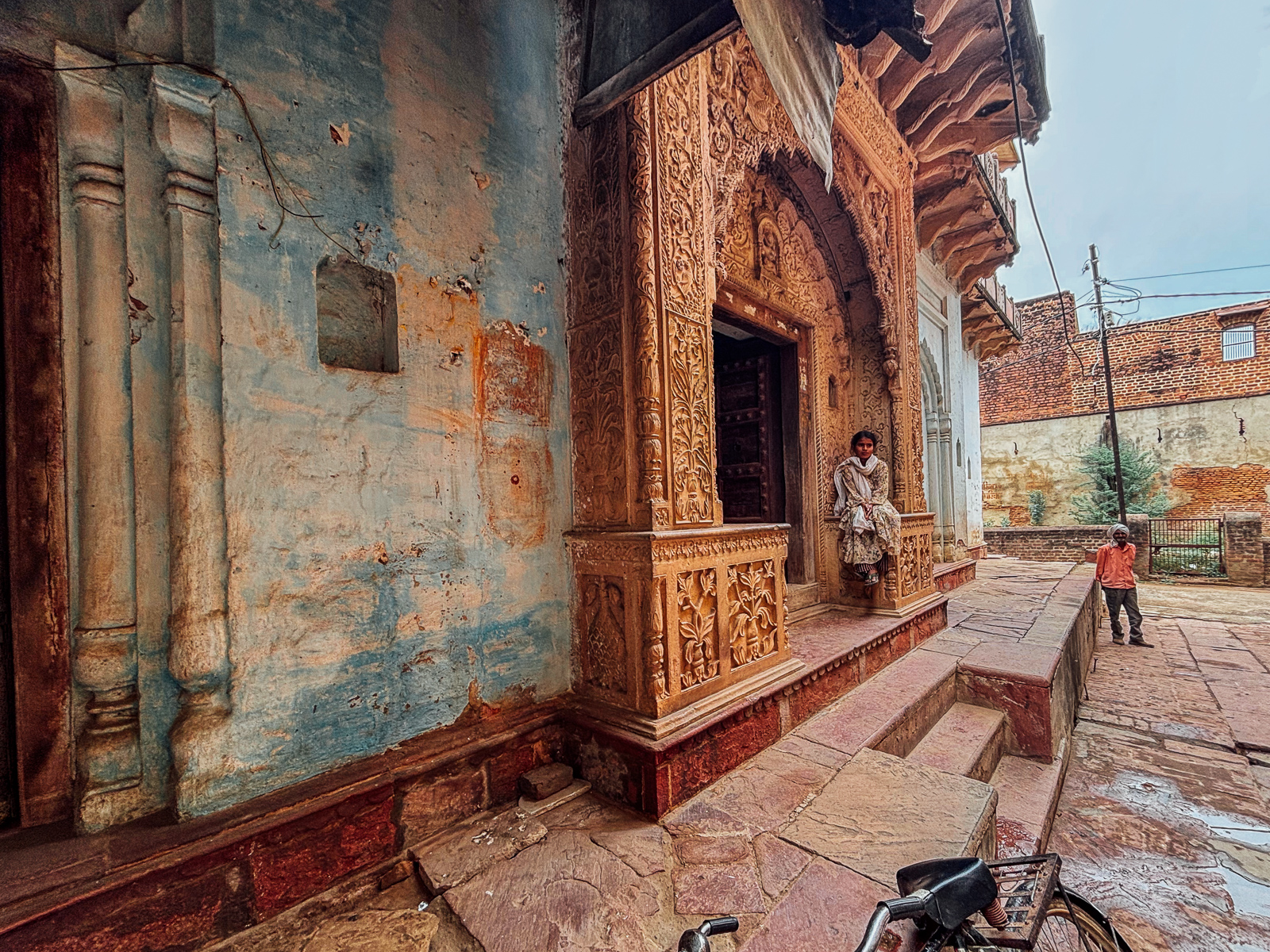 A girl delightfully poses for our group in the heritage village of Holi Pura, Uttar Pradesh (image by Virginia Wilde)