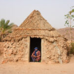 In the door of a traditional Tuareg stone house (image by Inger Vandyke)