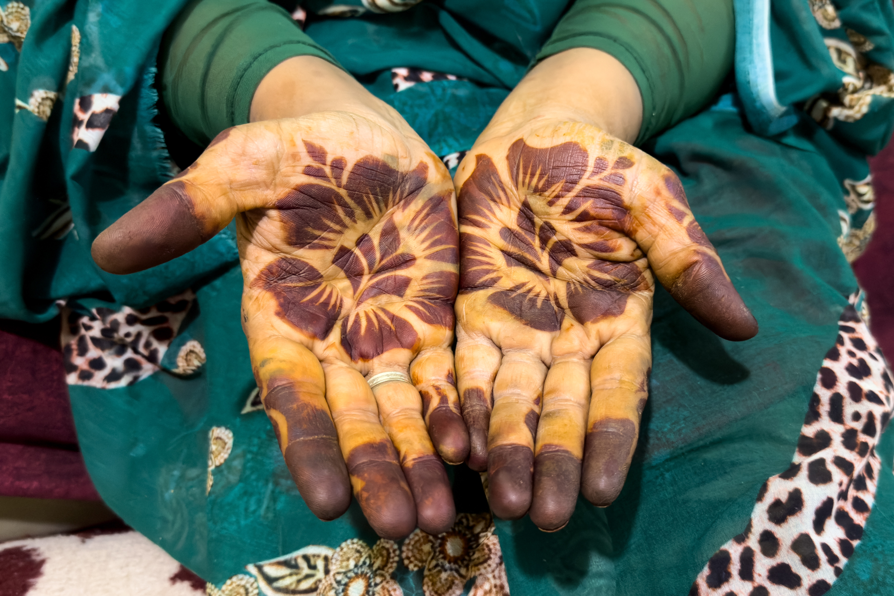 Hands decorated with henna (image by Inger Vandyke)