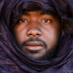 Tuareg man wrapped in indigo (image by Inger Vandyke)