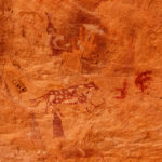Cave paintings of mixed eras in Tadrart (image by Inger Vandyke)
