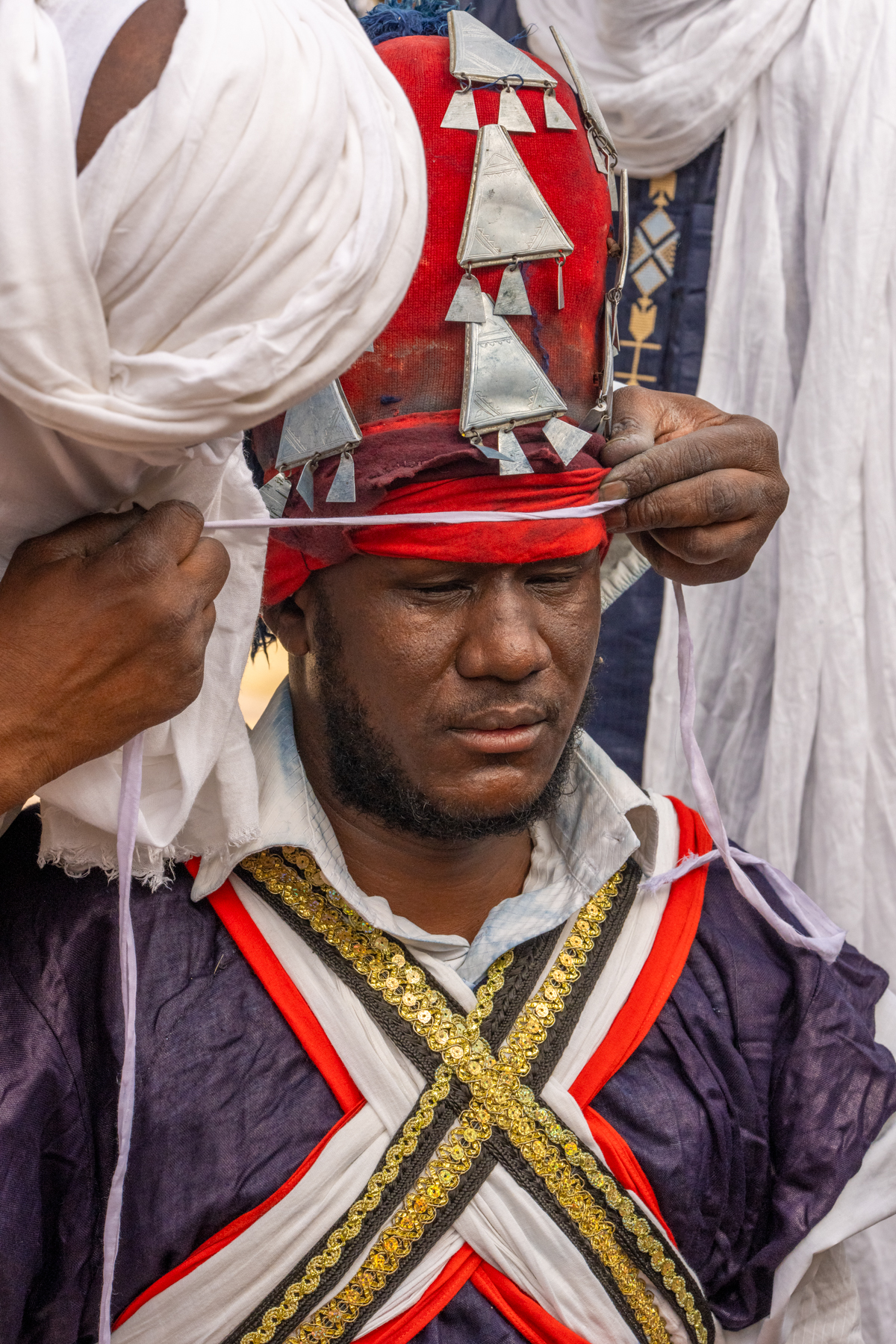 A Sabiba warrior being dressed in the preparation session for Al Mirhan (image by Inger Vandyke)