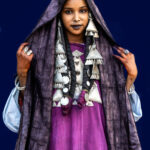 Young Tuareg girl in silver and indigo (image by Inger Vandyke)