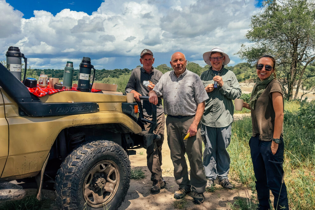 Tour members enjoy a coffee break in Tarangire National Park, at the start of our Tanzanian journey (image by Virginia Wilde)