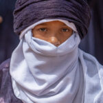 Tuareg boy in indigo Algeria (image by Inger Vandyke)