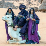 Tuareg people with camel in the desert near Djanet (image by Inger Vandyke)