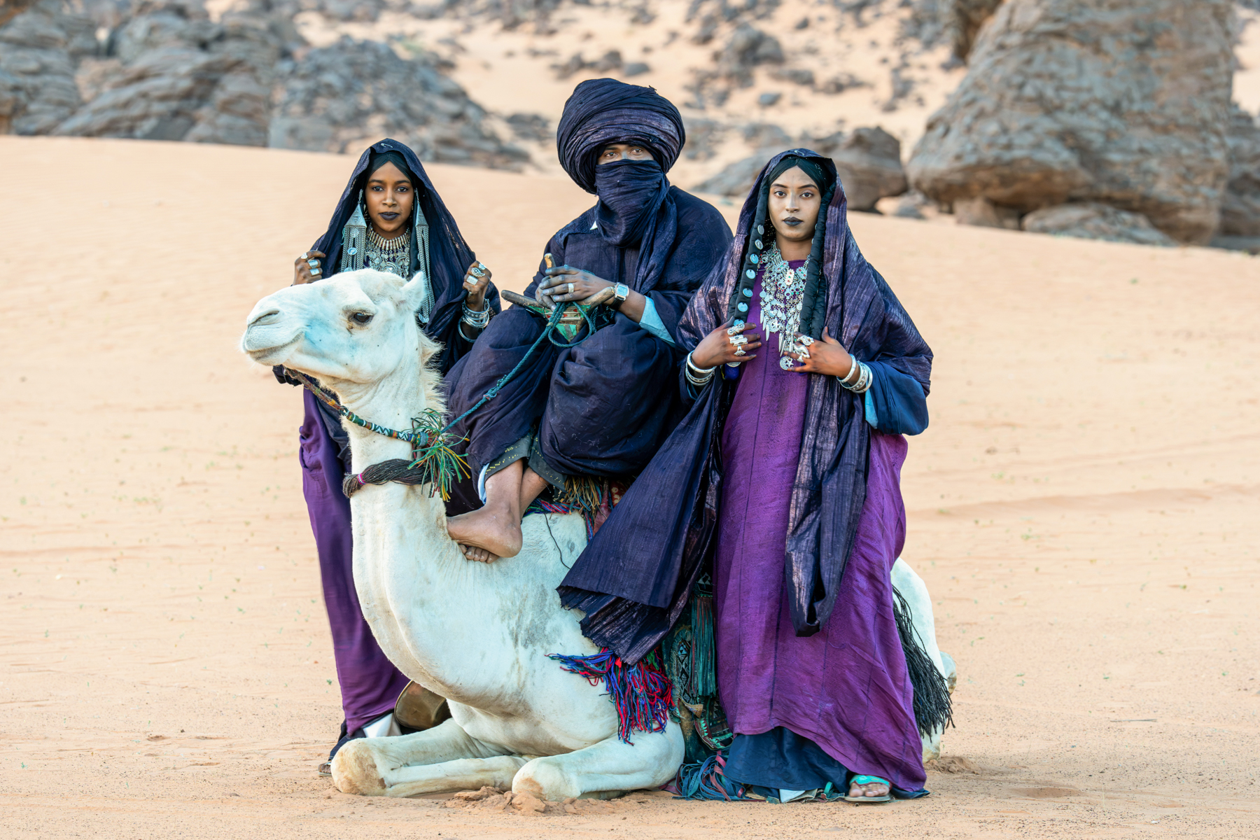 Tuareg people with camel in the desert near Djanet (image by Inger Vandyke)