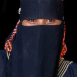 Woman in Niqab at the souk of Djanet(image by Inger Vandyke)