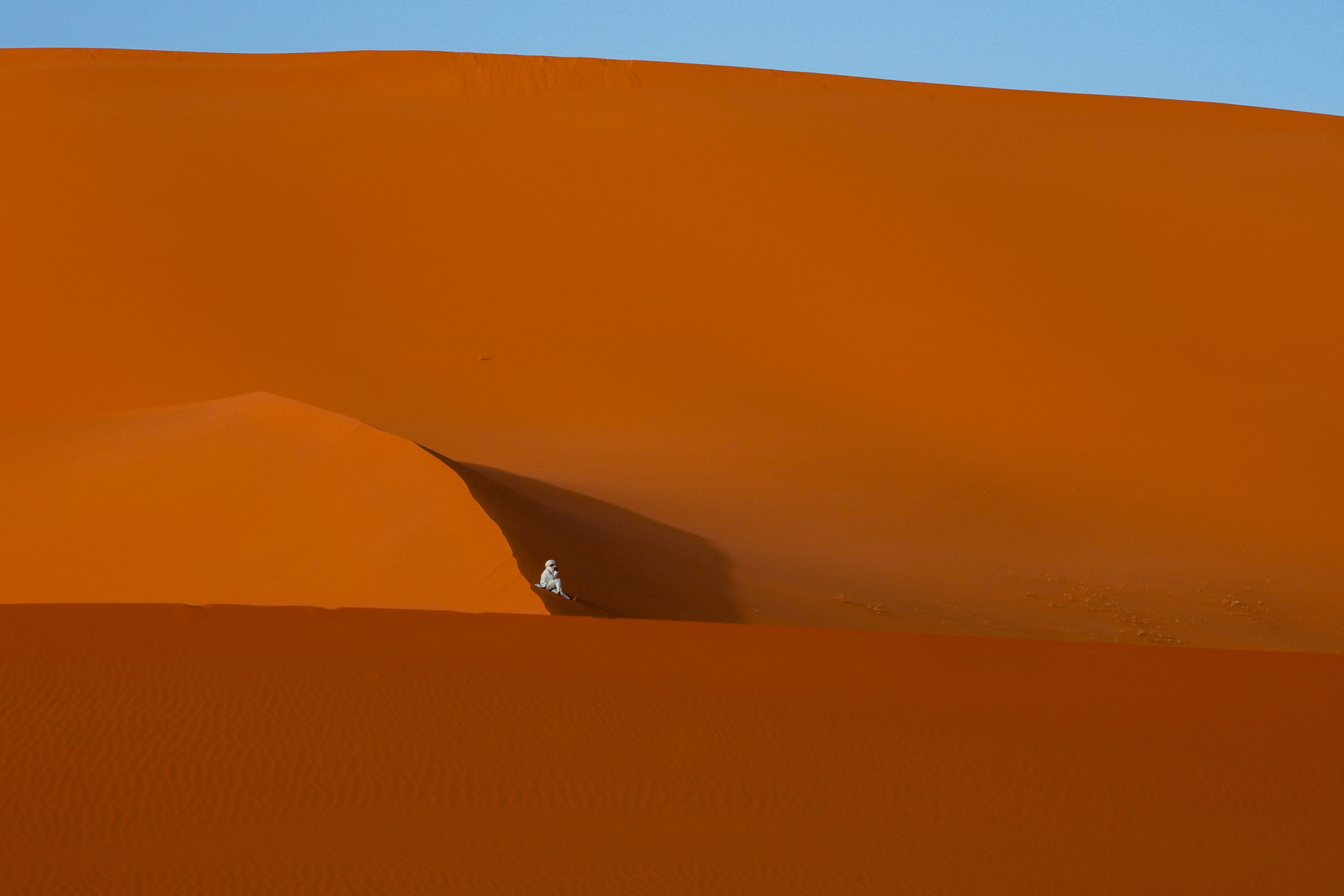 Dwarfed by the gigantic dunes of Tin Merzouga (image by Inger Vandyke)