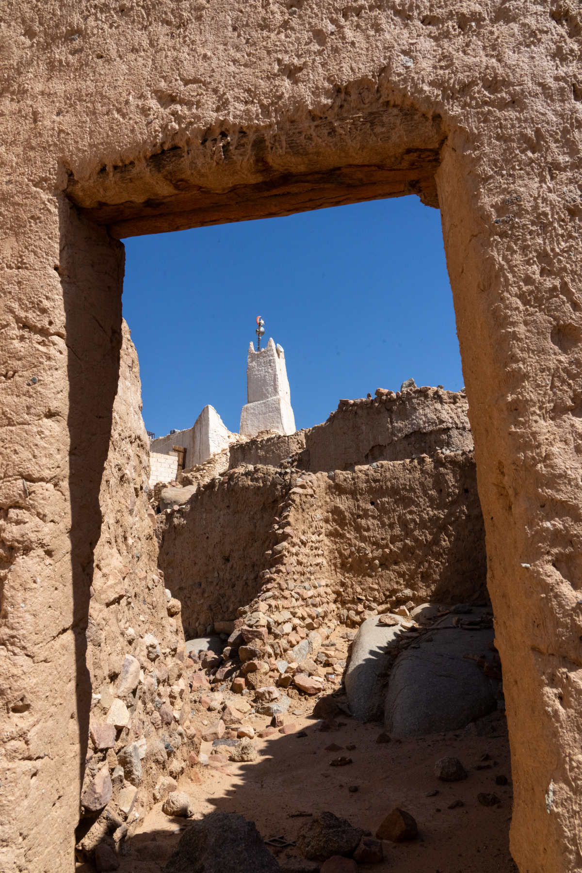 The tiny mud mosque of Zalouaz seen through a stone doorway of the K'Sour (image by Inger Vandyke)