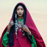 Hauntingly beautiful Tuareg girl in the desert of southern Algeria (image by Inger Vandyke)