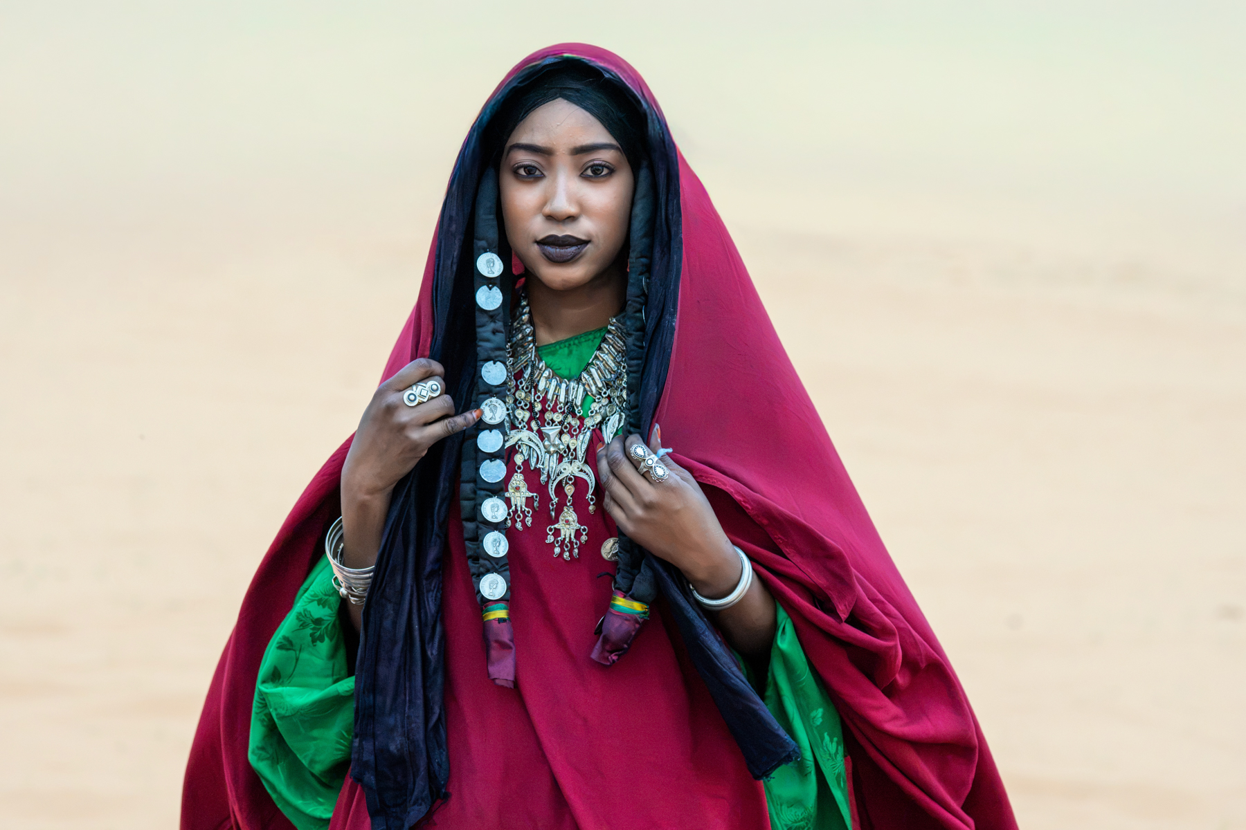 Hauntingly beautiful Tuareg girl in the desert of southern Algeria (image by Inger Vandyke)