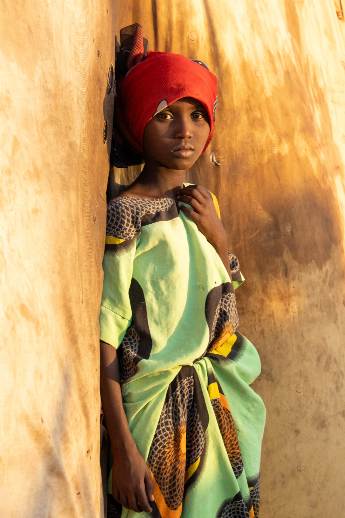 A beautiful young Gabbra girl in the doorway of her home (image by Inger Vandyke)