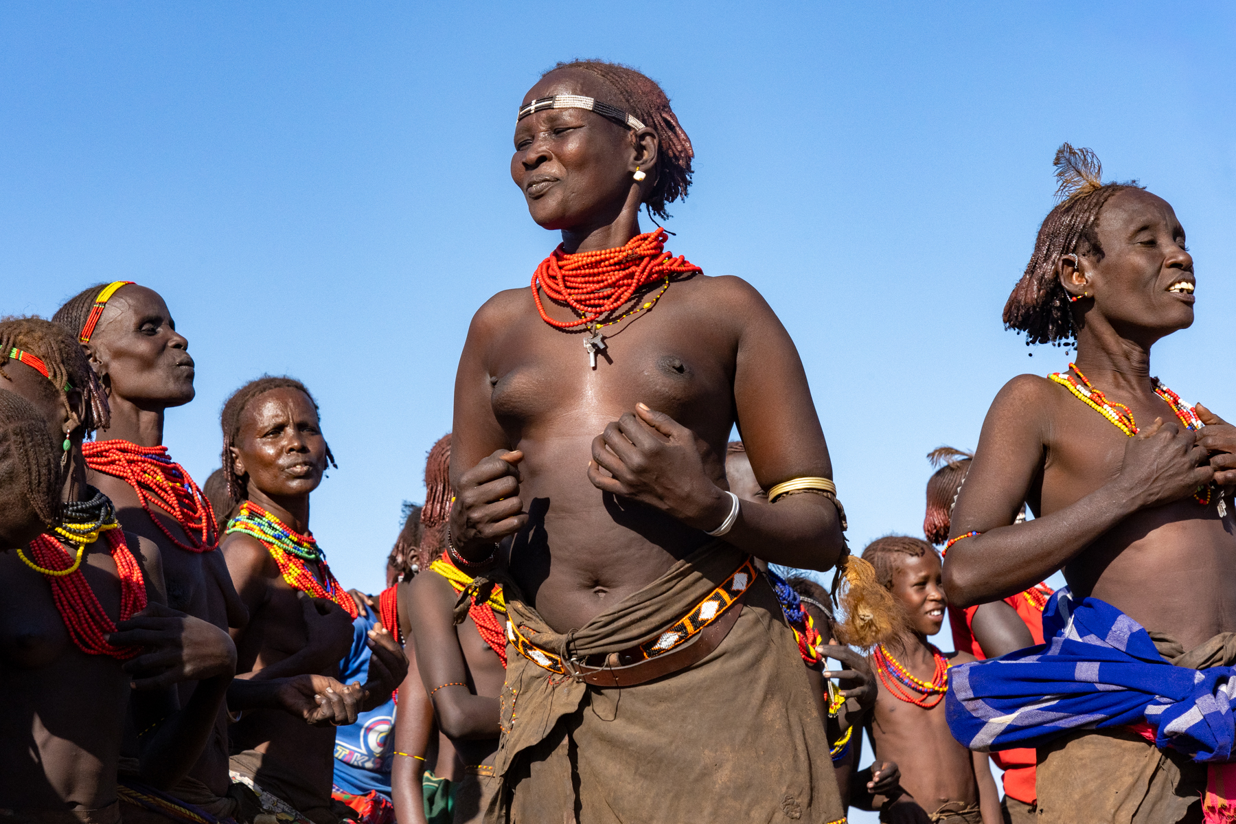 The pride of Dassanech women at Guol, the ceremony where one of their daughters will be selected for marriage (image by Inger Vandyke)