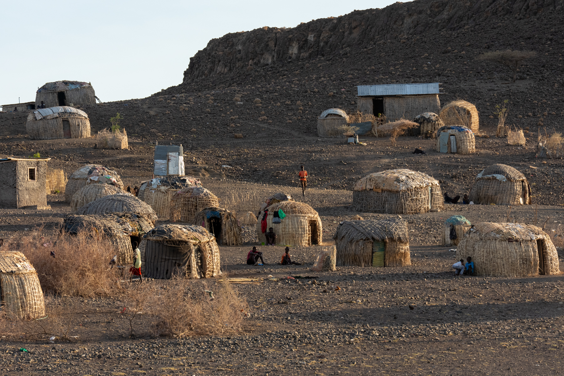 A village of El Molo people. All of these houses have been moved to higher ground in the past few years due to rising lake waters in Turkana (image by Inger Vandyke)