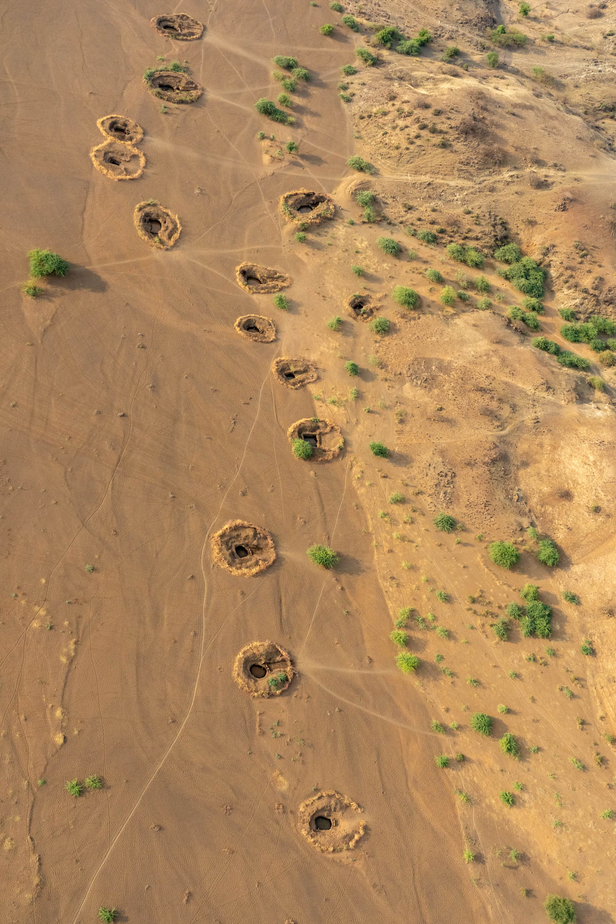 A line of Maasai wells seen from the sky (image by Inger Vandyke)