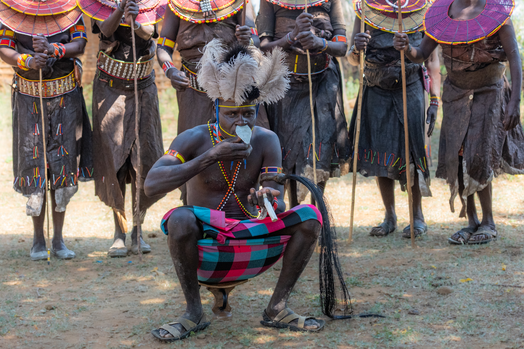 A Pokot headman sniffs some snuff before performing a ceremony (image by Inger Vandyke)