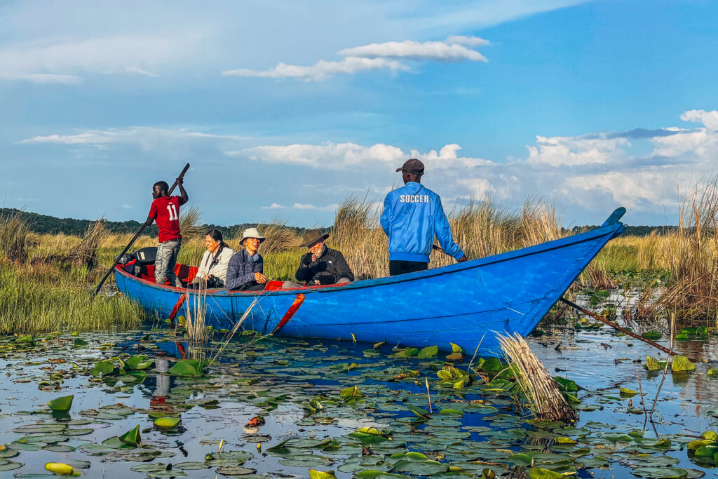 Punting through the reeds in search of Shoebills in Uganda's Mabamba Swamp (image by Virginia Wilde)