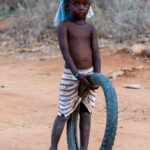 Young Rendille child with his tyre toy (image by Inger Vandyke)
